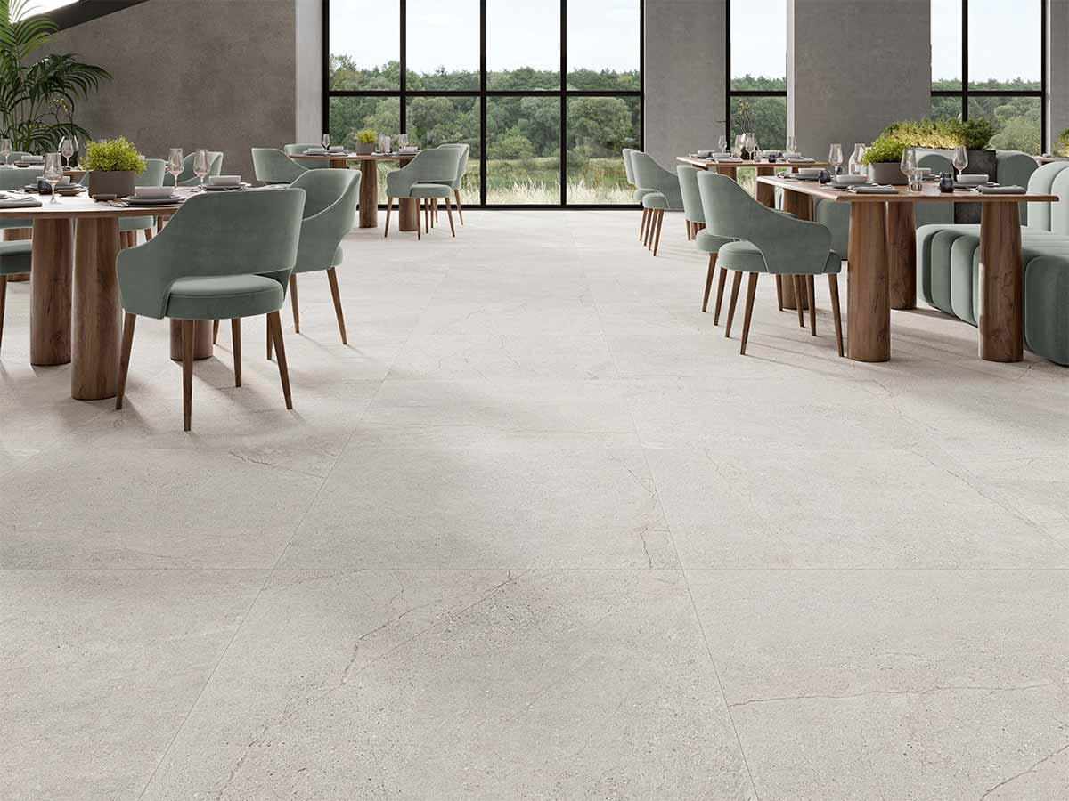 Porcelánico gran formato efecto cemento Sumum Pearl 100x100 antideslizante