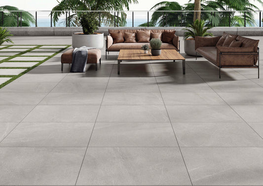 Ambiente con porcelánico Bellevue Grey efecto piedra gris 120x120